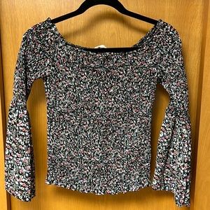 NO COMMENT FLORAL TOP.
